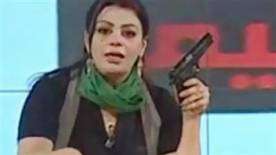 مذيعة القذافي «هالة المصراتي» تظهر على أشرطة مرئية لتنفي مقتلها على أيدي الثوار