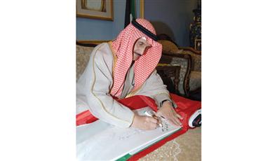 الشيخ د.ابراهيم الدعيج يوقع على علم الكويت