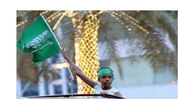 طفل سعودي يلوح بعلم المملكة في العيد الوطني في الرياض في 23 ايلول/سبتمبر 2013 (اف ب/ارشيف, فايز نور الدين)