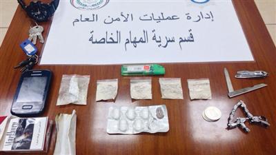 وافد مصري سقط بهيروين في قبضة الأمن
