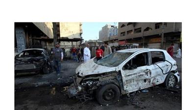 28 قتيلاً على الأقل في تفجير سيارتين مفخختين في بغداد