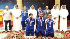 وليد الصميعي والجهازان الإداري والفني مع ابطال الكويت في الاسكواش