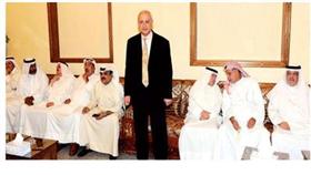 العيسى اثناء استقبال المهنئين