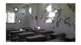 براميل الأسد المتفجرة تسقط على مدرسة في دوما