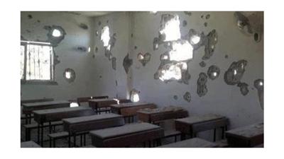 براميل الأسد المتفجرة تسقط على مدرسة في دوما