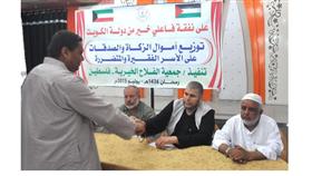 مساعدات نقدية كويتية توزع على الأسر الفقيرة والمحتاجة والمتضررة في غزة