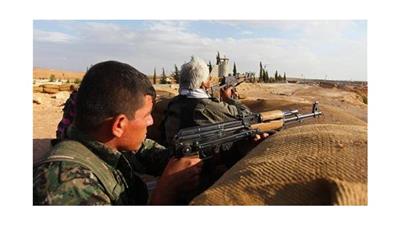مقاتلون أكراد في كوباني