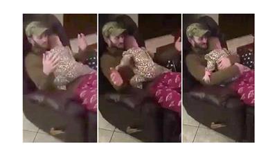 بالفيديو - رضيعة «تجبر» والدها على معانقتها بحنان