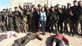بالصور - مشاهد من المجزرة.. من هي المذيعة التي التقطت «سيلفي» مع جثث ضحايا حلب؟