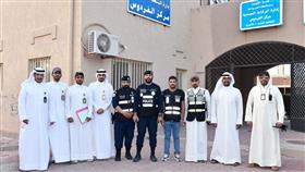 الفريق المشترك أمام أحد المنازل المخالفة بمنطقة الفردوس