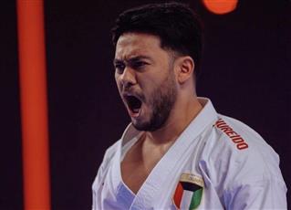 البطل محمد أحمد حسين يحرز الميدالية الذهبية في مسابقة الكاتا فردي