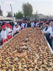 أهالي بصرى الشام يحتفلون بطريقتهم ضمن احتفالية النصر بأكبر منسف مليحي بريف درعا